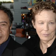 Portrait of Irving H. Vincent, renowned theater director and adoptive father of Vin Diesel, attending a public event with his wife.