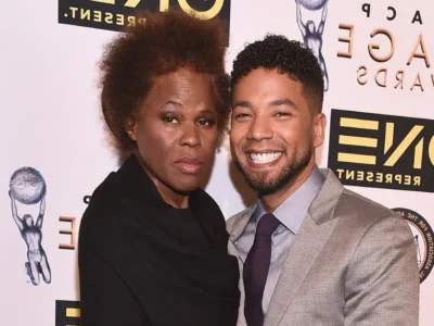 Janet Smollett smiling warmly at a community event, reflecting her dedication as a civil rights activist and beloved family matriarch.