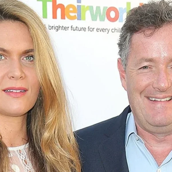 Marion Shalloe and Piers Morgan at a charity event, posing together in formal attire for a public appearance.