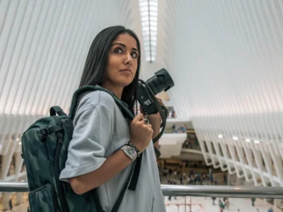 Natalie Amrossi - renowned aerial photographer shooting New York City from helicopter view.