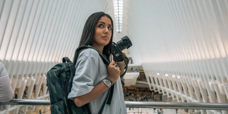 Natalie Amrossi - renowned aerial photographer shooting New York City from helicopter view.