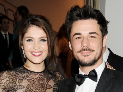 Stefano Catelli attending a formal event in a tuxedo, showcasing his style and presence in the fashion industry.
