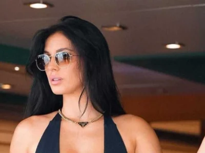 Camilla Araujo in stylish sunglasses and black outfit, luxury lifestyle linked to camilla araujo net worth.