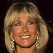 Alexis Maas smiling at a formal event, showcasing her elegant style and grace, reflecting her intriguing life story.