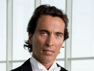 Carlo Ponti Italian film producer portrait in formal attire discussing his net worth and wealth legacy