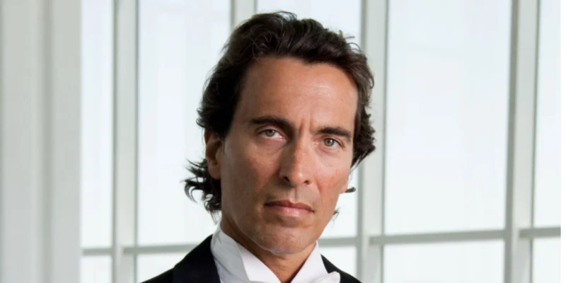Carlo Ponti Italian film producer portrait in formal attire discussing his net worth and wealth legacy