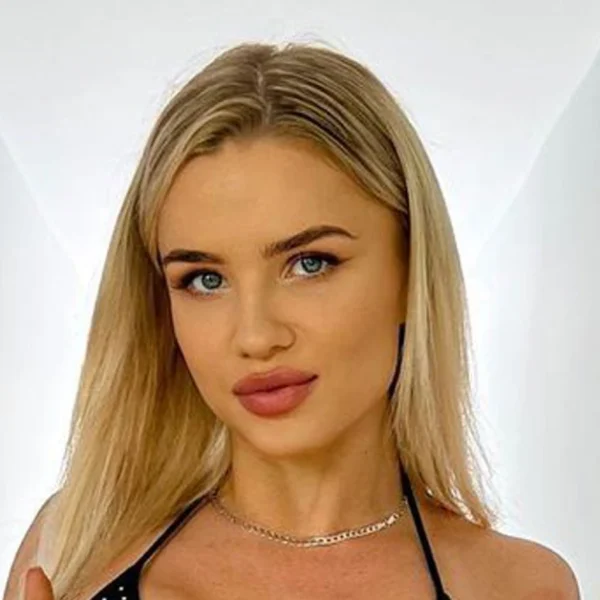 Daniella Hemsley posing confidently with blonde hair and subtle makeup, showcasing the influencer's transformation from boxing controversy to social media success.RetryClaude can make mistakes. Please double-check responses.
