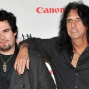 Dash Cooper standing with his father Alice Cooper at a charity event, showcasing the rock music legacy passing between generationsRetryClaude can make mistakes. Please double-check responses.