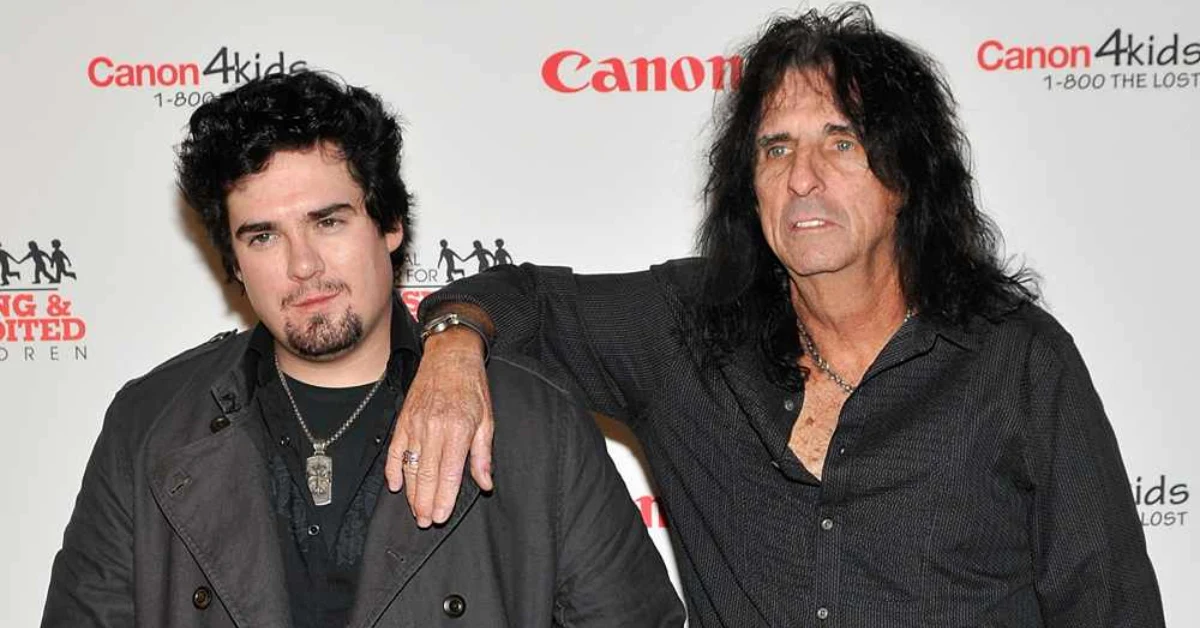 Dash Cooper standing with his father Alice Cooper at a charity event, showcasing the rock music legacy passing between generationsRetryClaude can make mistakes. Please double-check responses.