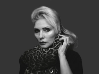 Debbie Harry Net Worth - Iconic Blondie singer performing live, representing her successful music career and accumulated wealth