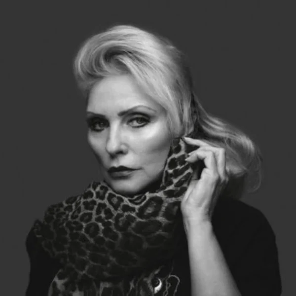 Debbie Harry Net Worth - Iconic Blondie singer performing live, representing her successful music career and accumulated wealth