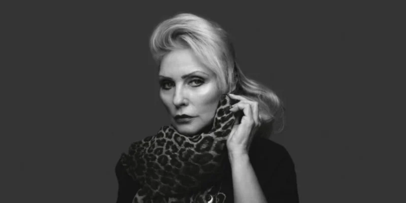 Debbie Harry Net Worth - Iconic Blondie singer performing live, representing her successful music career and accumulated wealth