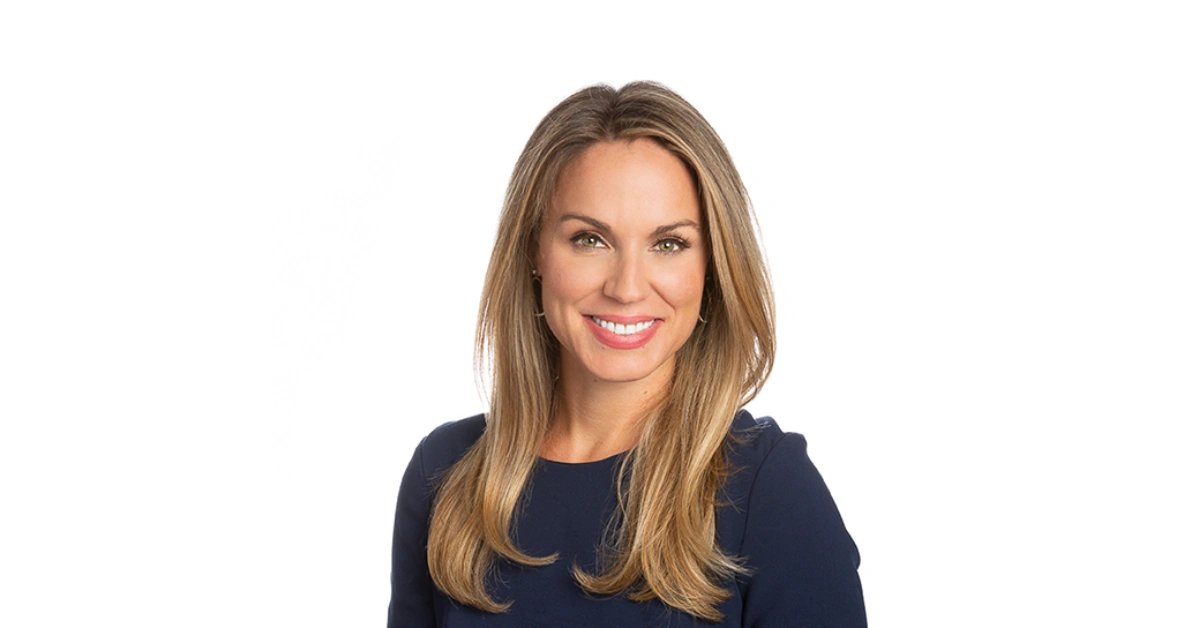 Nicole Saphier speaking at a medical conference, highlighting her role as a breast radiologist and cancer detection expert.