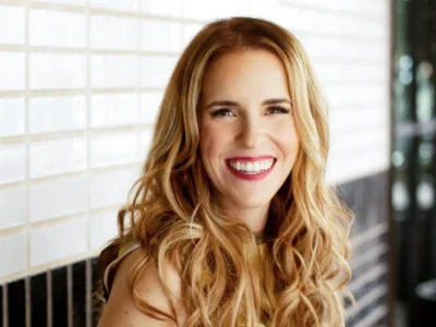 Portrait of Rachel Hollis, motivational speaker and bestselling author, inspiring women through her books and empowering messages.