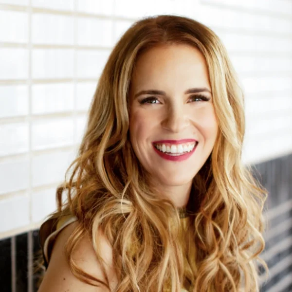 Portrait of Rachel Hollis, motivational speaker and bestselling author, inspiring women through her books and empowering messages.