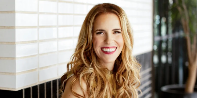 Portrait of Rachel Hollis, motivational speaker and bestselling author, inspiring women through her books and empowering messages.